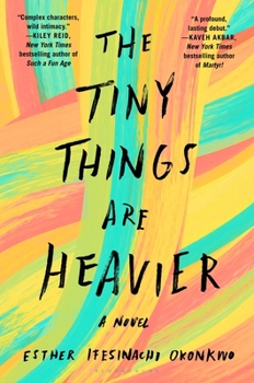 Paperback The Tiny Things Are Heavier Book