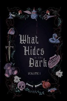 Paperback What Hides in the Dark Book