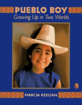 Paperback Pueblo Boy: Growing Up in Two Worlds Book
