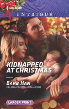 Mass Market Paperback Kidnapped at Christmas [Large Print] Book