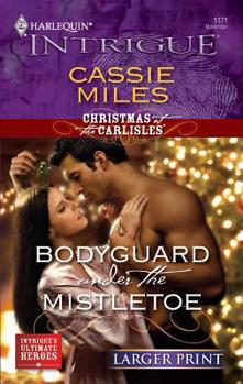 Mass Market Paperback Bodyguard Under the Mistletoe [Large Print] Book