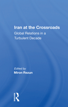 Paperback Iran at the Crossroads: Global Relations in a Turbulent Decade Book