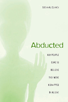 Paperback Abducted: How People Come to Believe They Were Kidnapped by Aliens Book