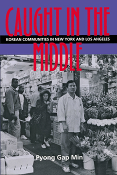 Paperback Caught in the Middle: Korean Communities in New York and Los Angeles Book