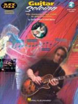 Paperback Guitar Soloing: Essential Concepts Series [With CD] Book