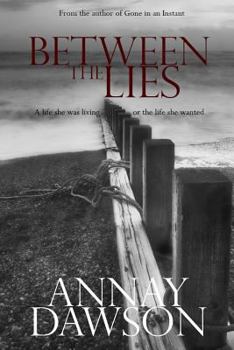 Paperback Between the Lies Book