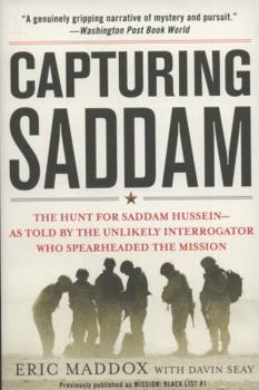 Paperback Capturing Saddam: The Hunt for Saddam Hussein--As Told by the Unlikely Interrogator Who Spearheaded the Mission Book
