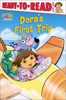 Paperback Dora's First Trip Book