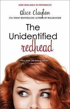 Paperback The Unidentified Redhead Book