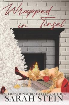 Paperback Wrapped in Tinsel Book