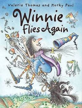 Paperback Winnie Flies Again Book