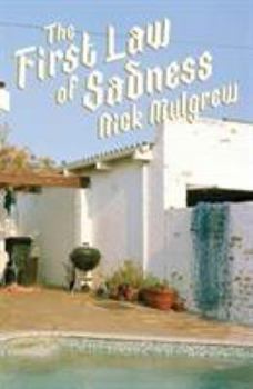Paperback The first law of sadness Book