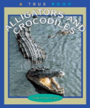 Paperback Alligators and Crocodiles Book