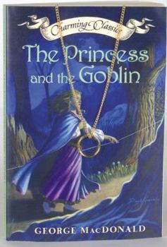 Paperback The Princess and the Goblin Book and Charm Book