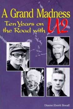 Paperback A Grand Madness: Ten Years on the Road with U2 Book