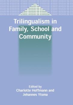 Paperback Trilingualism in Family, School and Community Book