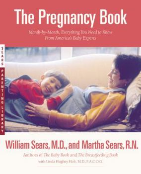 Paperback The Pregnancy Book: A Month-By-Month Guide Book