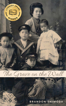 Paperback The Grave on the Wall Book