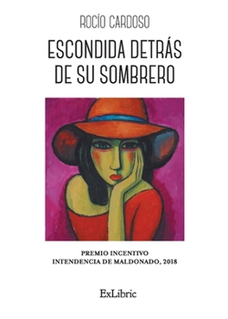 Paperback Escondida detrás de su sombrero [Spanish] Book