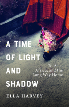 Paperback A Time of Light and Shadow: To Asia, Africa, and the Long Way Home Book