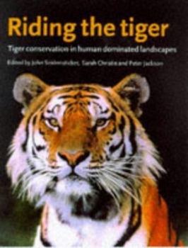 Paperback Riding the Tiger: Tiger Conservation in Human-Dominated Landscapes Book