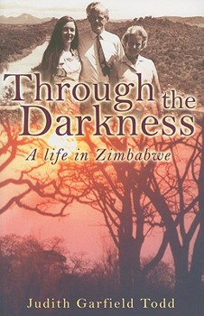 Paperback Through the Darkness: A Life in Zimbabwe Book