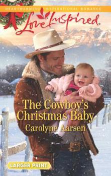 Mass Market Paperback The Cowboy's Christmas Baby [Large Print] Book