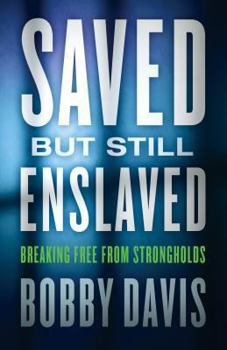 Paperback Saved But Still Enslaved: Breaking Free from Strongholds Book