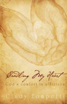 Paperback Cradling My Heart Book