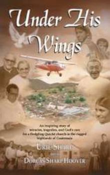 Paperback Under His wings Book