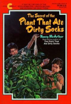 Paperback The Secret of the Plant That Ate Dirty Socks Book