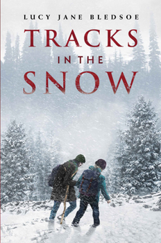 Paperback Tracks in the Snow Book