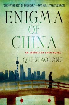 Paperback Enigma of China Book