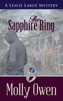Paperback The Sapphire Ring: A Leslie LaRue Mystery Book