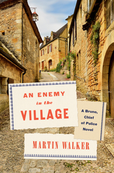 Hardcover An Enemy in the Village: A Bruno, Chief of Police Novel Book