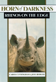 Paperback Horn of Darkness: Rhinos on the Edge Book