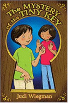Paperback The Mystery of the Tiny Key Book
