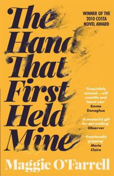 Paperback The Hand That First Held Mine Book