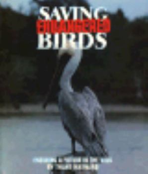 Hardcover Saving Endangered Birds: Ensuring a Future in the Wild Book