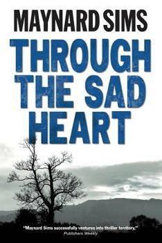 Paperback Through The Sad Heart Book