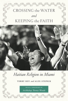 Paperback Crossing the Water and Keeping the Faith: Haitian Religion in Miami Book