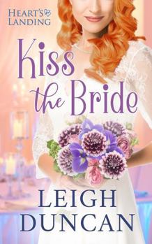 Paperback Kiss The Bride (Heart's Landing) Book