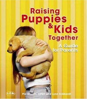 Paperback Raising Puppies & Kids Together: A Guide for Parents Book