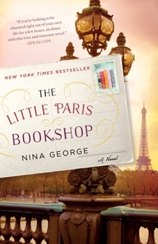 Paperback The Little Paris Bookshop Book