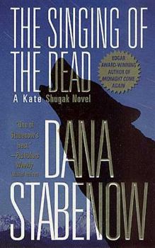 Mass Market Paperback The Singing of the Dead: A Kate Shugak Novel Book