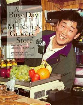 Paperback A Busy Day at Mr. Kang's Grocery Book