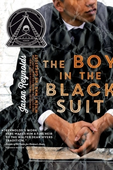 Paperback The Boy in the Black Suit Book