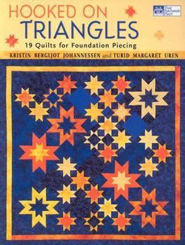 Paperback Hooked on Triangles: 19 Quilts for Foundation Piecing Book