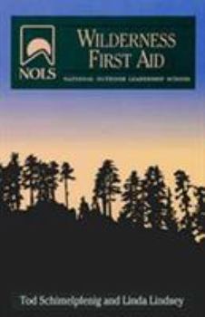 Paperback Nols Wilderness First Aid Book