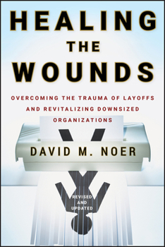 Hardcover Healing the Wounds: Overcoming the Trauma of Layoffs and Revitalizing Downsized Organizations Book